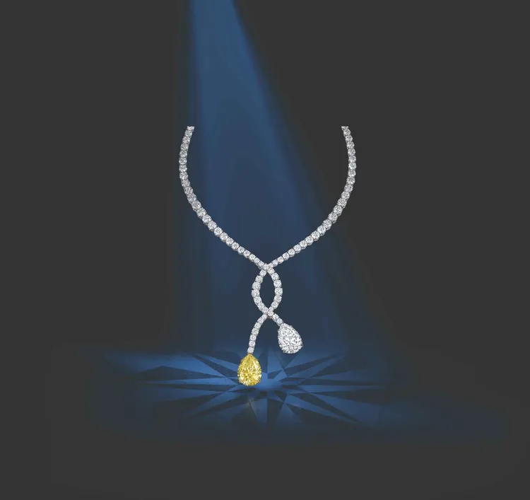 海瑞溫斯頓以黃鑽珠寶迎接春天，全新Lariat黃鑽鉑金項鍊即以流暢線條並交叉垂墜設計，兩端鑲墜各為10.88克拉水滴形切割黃鑽以及重約10.88克拉水滴形切割白鑽，風格簡約而流利，1億5941萬元。品牌提供