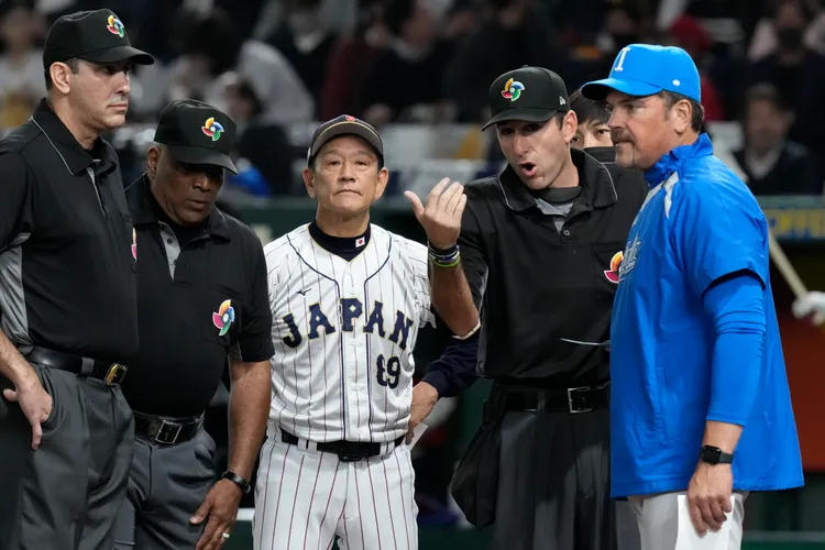 栗山的信念是讓選手充分發揮長才；圖為16日對義大利之戰。美聯社