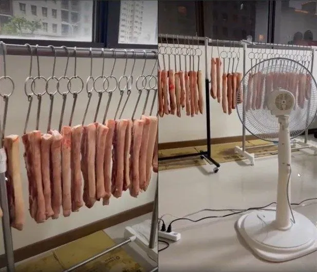 館長的燒肉在類似無塵室的地方，用電風扇吹惹議。翻攝自PTT