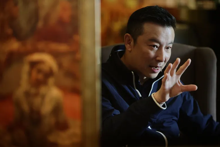 林煒露出傳道授業的神情。林林攝