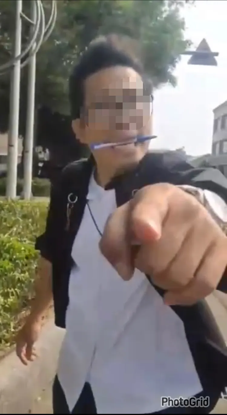 鄭男討不到菸抽，竟咬著筆爆走了。讀者提供