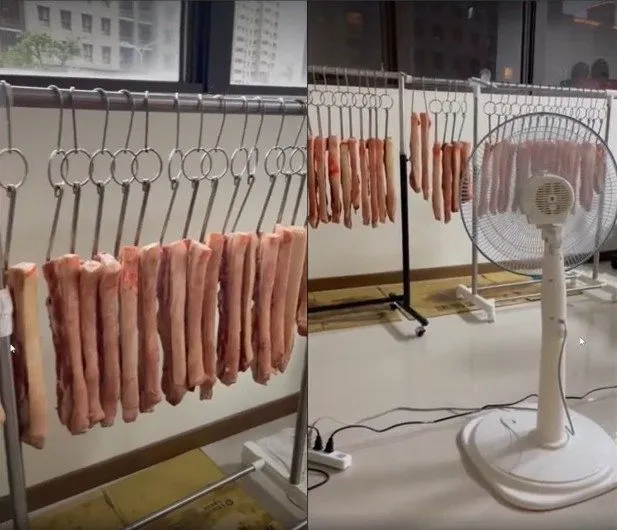 館長的燒肉在類似無塵室的地方，用電風扇吹惹議。翻攝自PTT