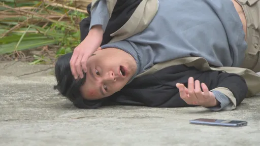 黃文星為救老媽跑給歹徒追 從2層樓往下摔機也破了