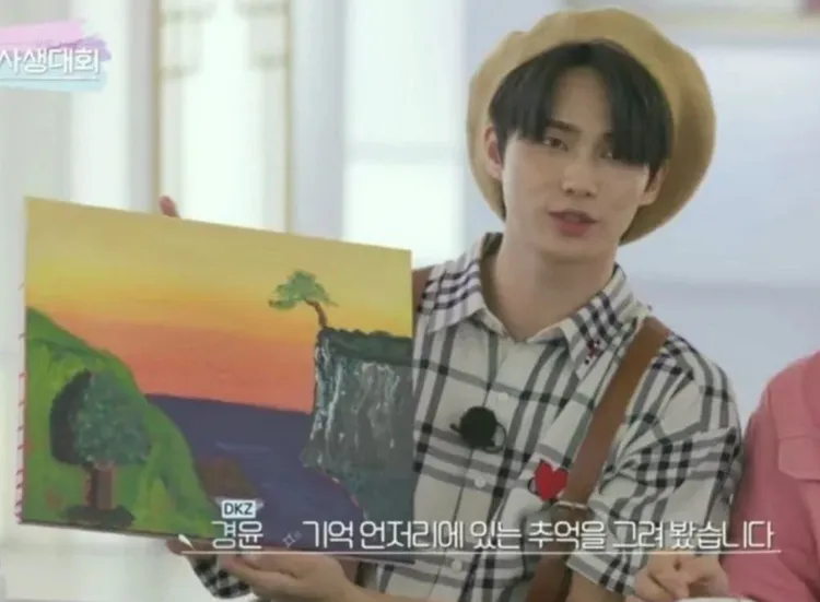 庚潤過去在DKZ寫真大賽影片中的畫作，證實是攝理教的聖地月明洞。翻攝naver