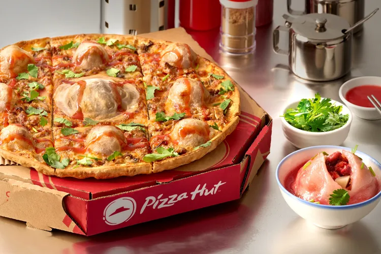 必勝客「呷霸王紅糟肉圓比薩」限時限量開賣。業者提供