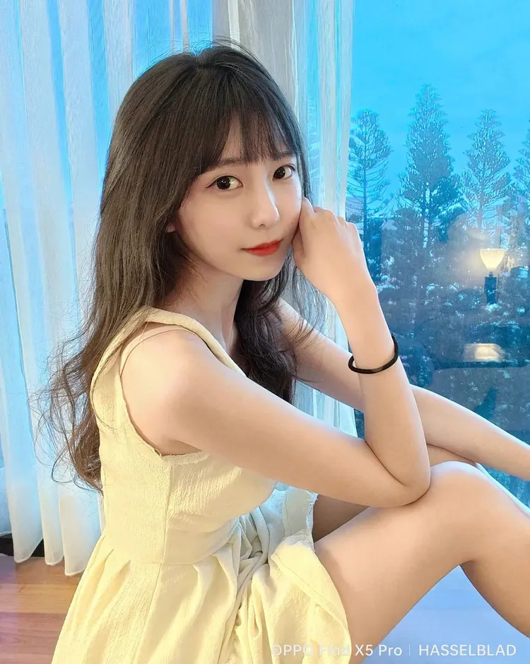 阿倪有一雙水汪汪的大眼睛。