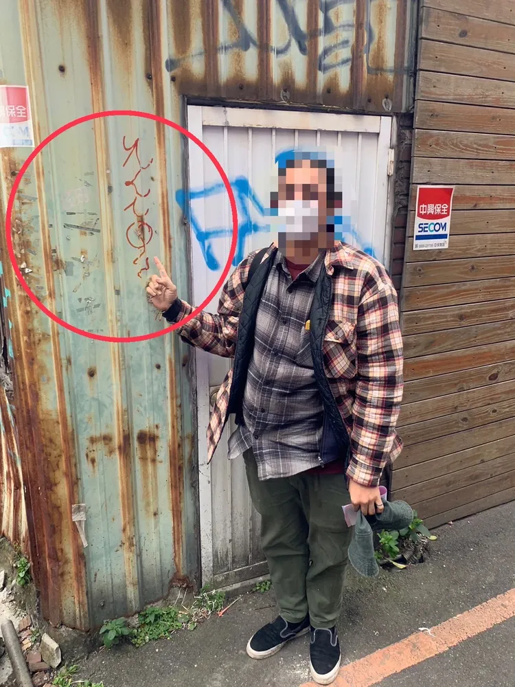 菲律賓籍男子坦承在牆上噴漆。翻攝畫面