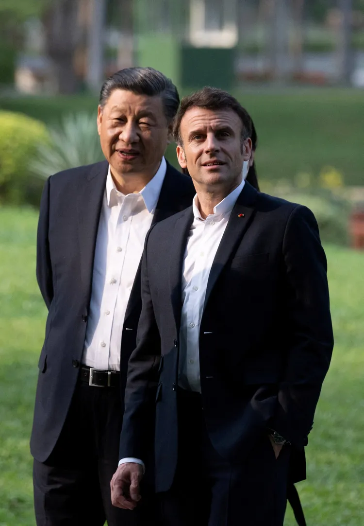 法國總統馬克宏（右）本月訪問中國期間，與中國國家主席習近平相談甚歡。路透社
