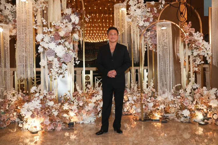 江宏恩一身帥氣黑西裝出席婚禮。彭欣偉攝