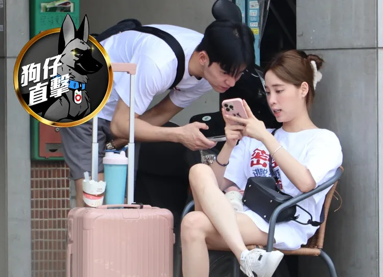 歐陽妮妮（右）一大早就跟男友張書豪離家出走，推著「情侶款」浪跡天涯行李箱到洗車場取車。特勤中心攝