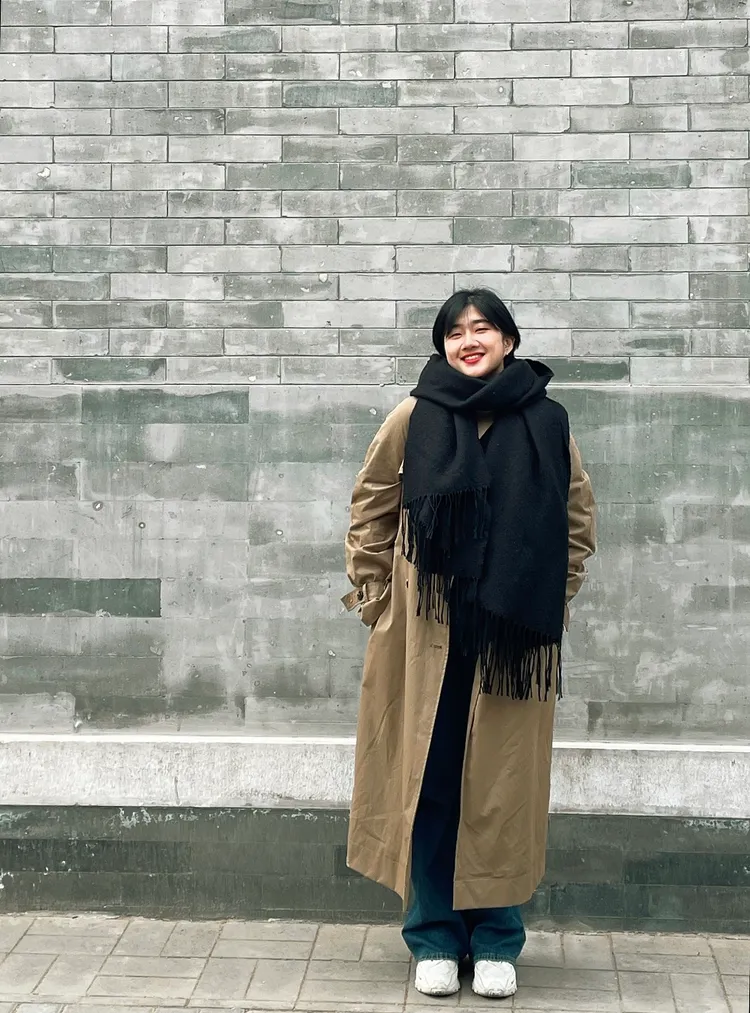 楊易紋遊歷北京鼓樓大街石牆邊一隅。航港局提供