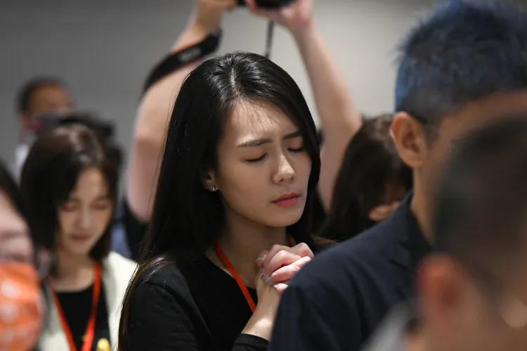 李又汝禱告。彭欣偉攝