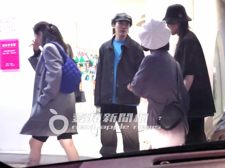 林哲熹（中）和哥哥林頤原不時在街上互動，兄弟倆感情很好。特勤中心攝