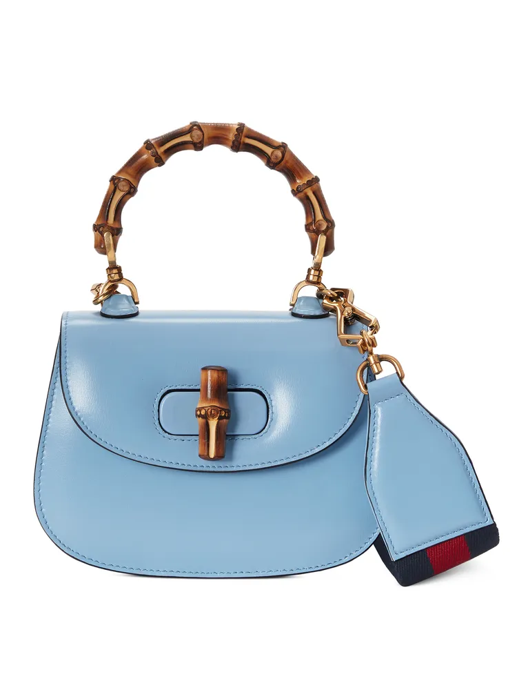 GUCCI Bamboo 1947系列天藍色迷你手提肩背包，12萬7600元。品牌提供