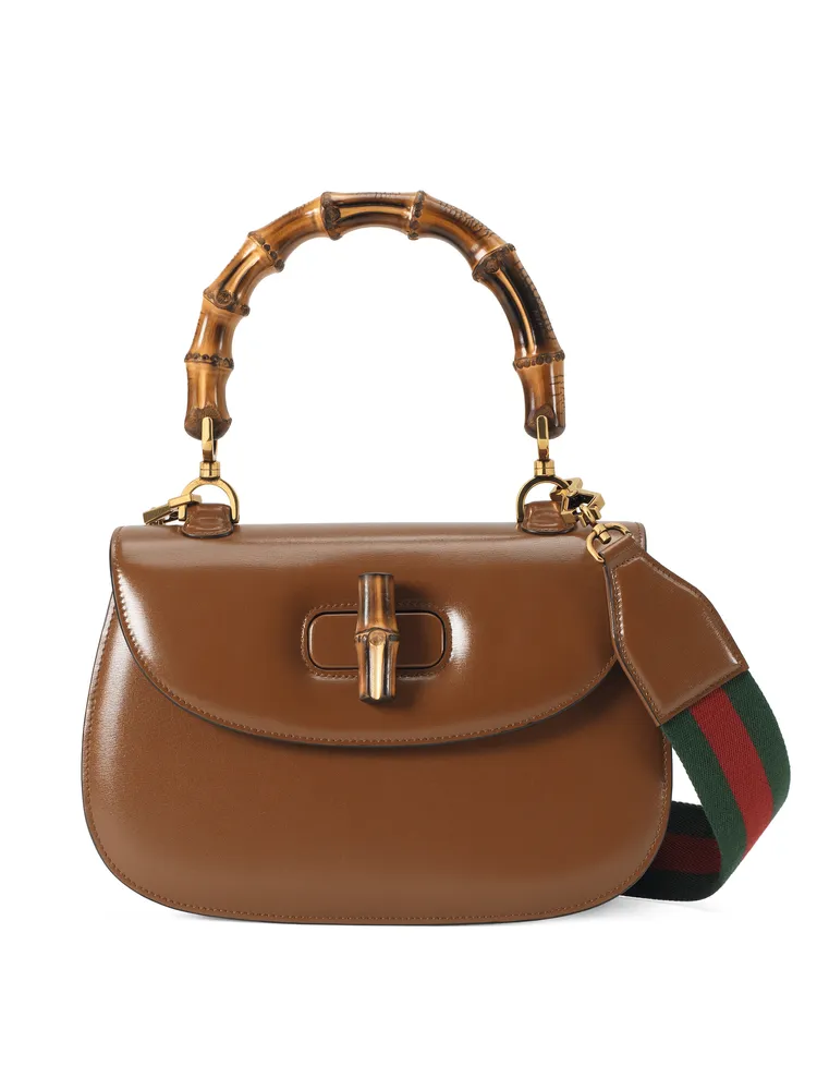 GUCCI Bamboo 1947系列棕色中型手提肩背包，18萬4900元。品牌提供