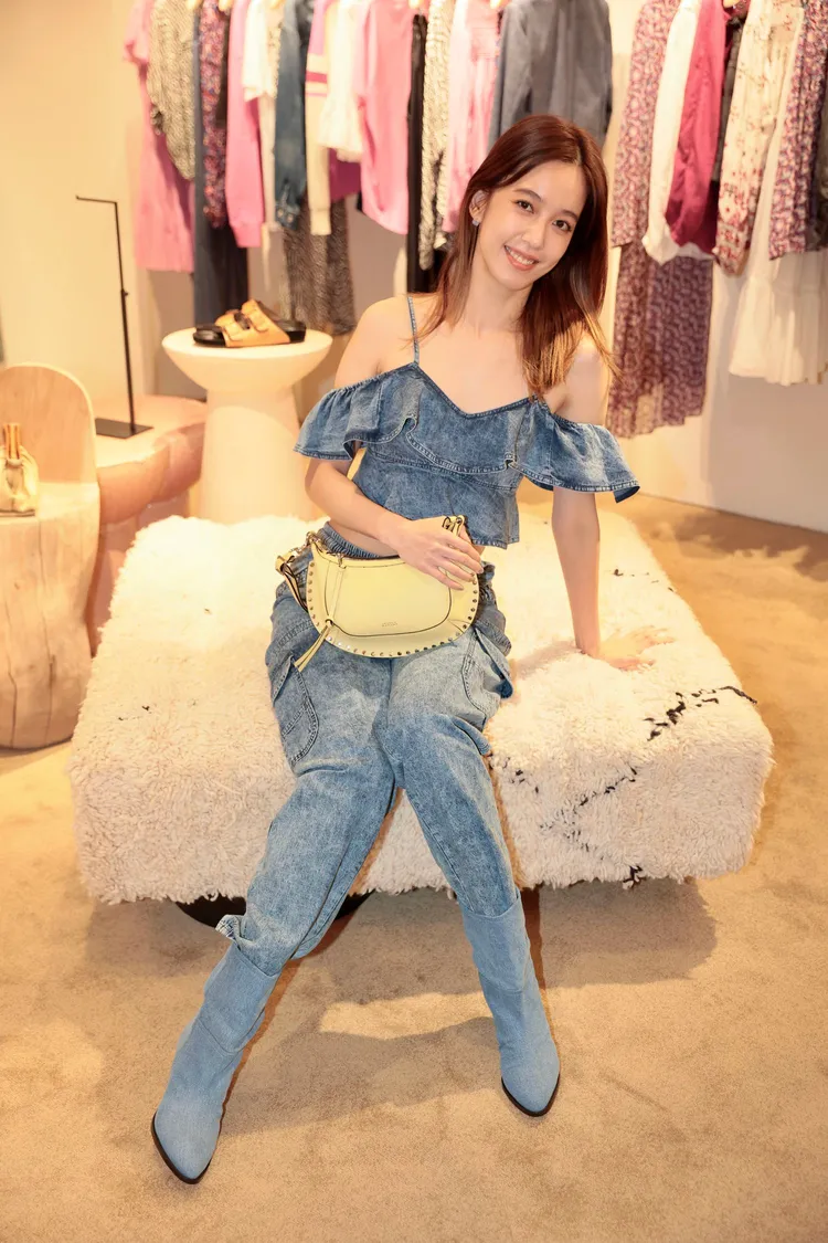 Oskan Moon系列包款與丹寧靴都讓陳庭妮大喊喜愛。彭欣偉攝