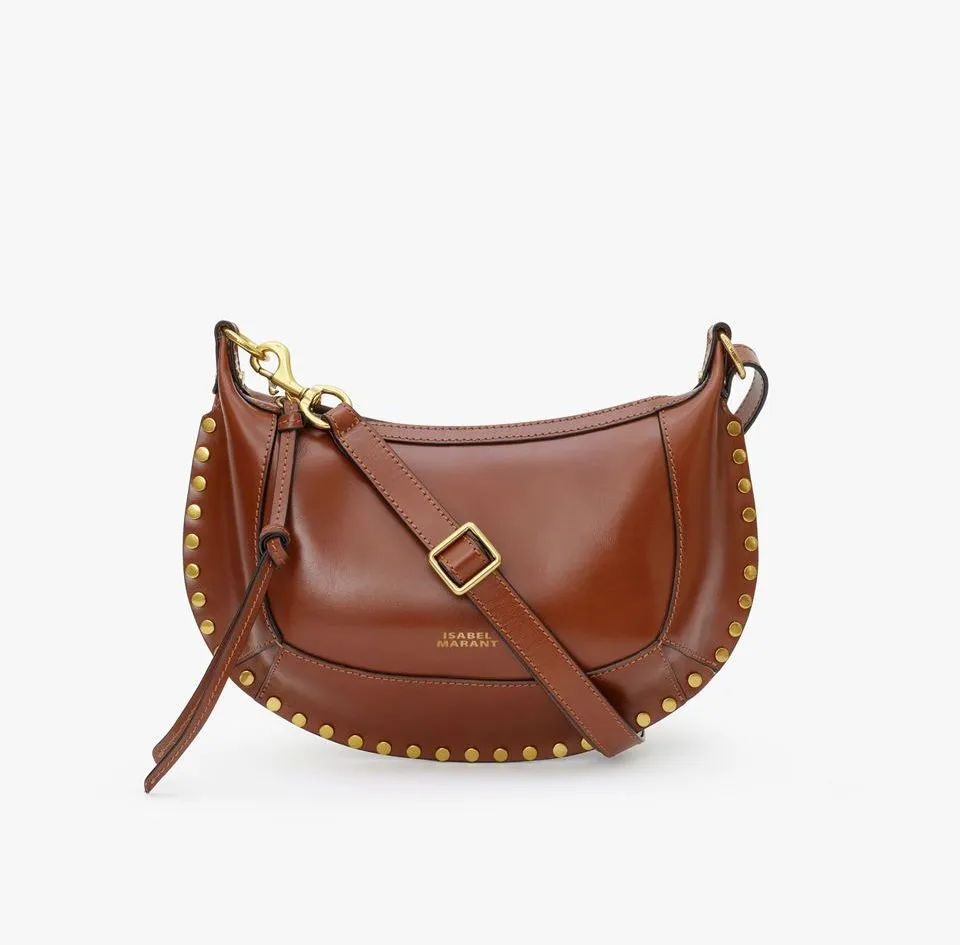 Oskan Moon干邑棕亮面皮革包，2萬8800元。品牌提供