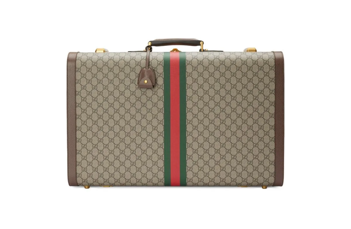 棕色GG提花行旅箱，23萬4500元。品牌提供
