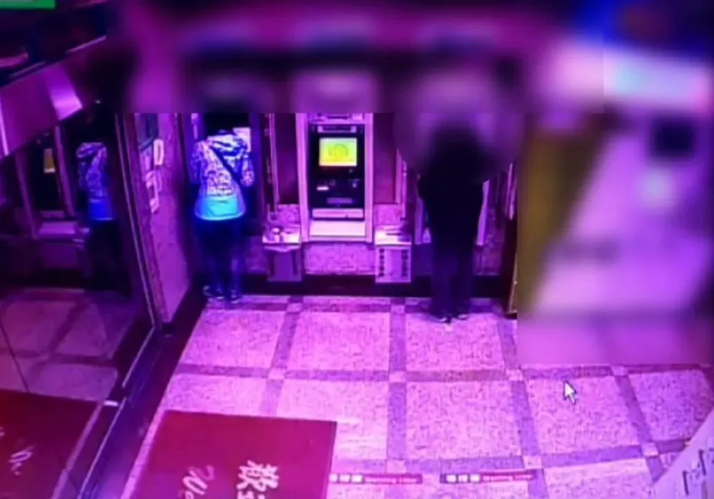 車手胡男到新北蘆洲區的ATM取款。翻攝畫面