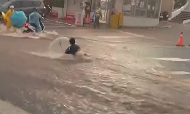 女大聲最後奮力起身，所幸未受傷。讀者提供