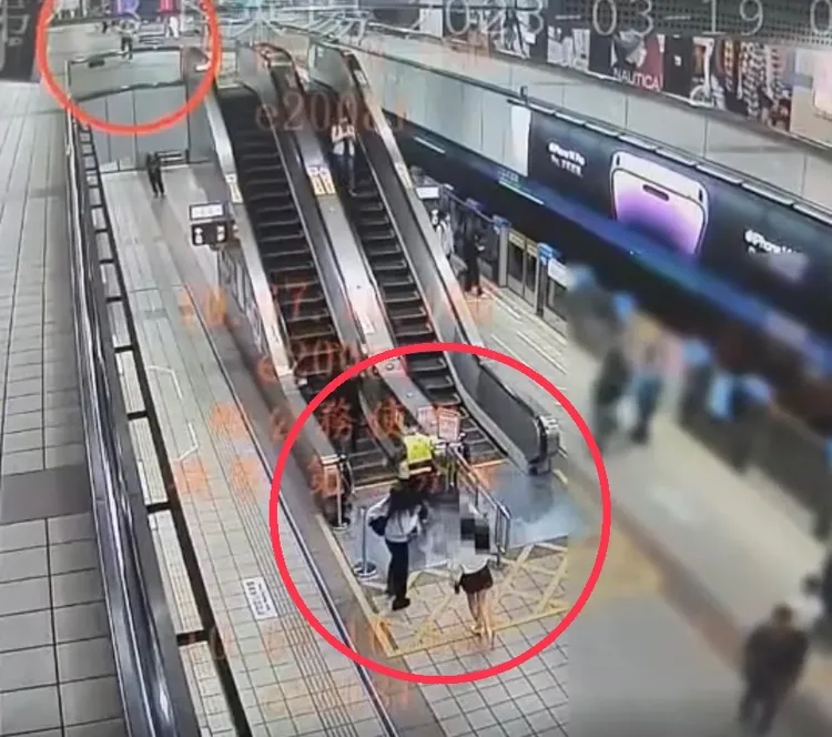 警方在捷運站內追捕企圖逃逸的陳男。翻攝畫面