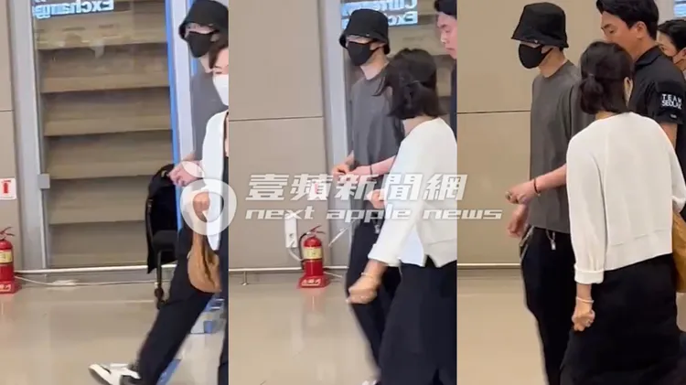 金宣虎戴著黑色漁夫帽、口罩，今天下午5點左右步出仁川機場入境大廳。讀者提供