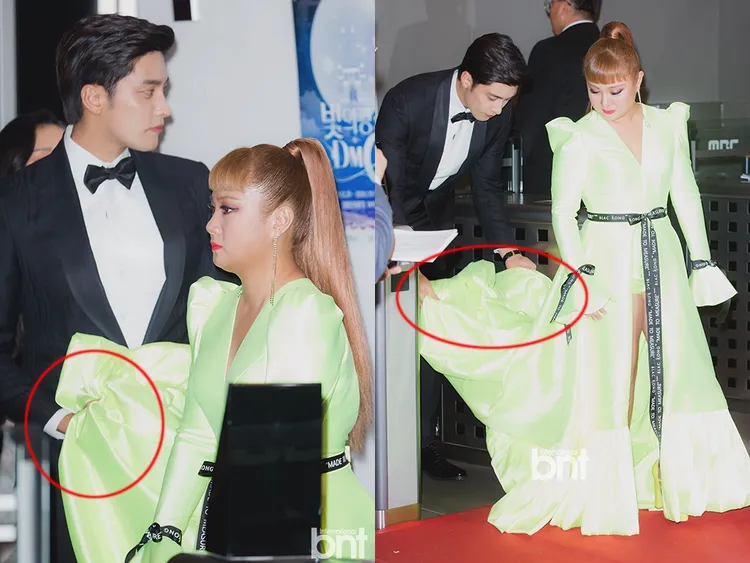 成勛在MBC演藝大賞幫朴娜勑拉裙襬。翻攝bnt