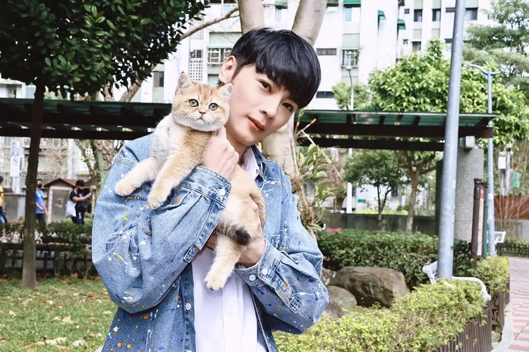 古曜威與KUDI就像家人親密。施昂強攝