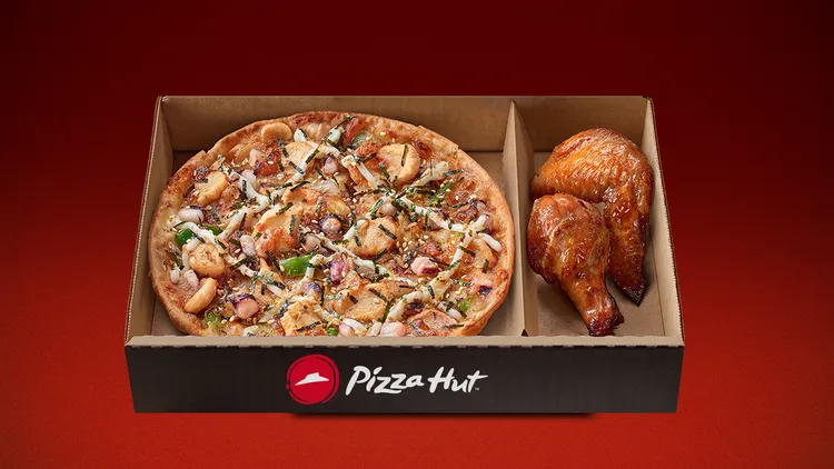 必勝客My Hot Box指定口味個人比薩6月底前加一元多一件副食。業者提供