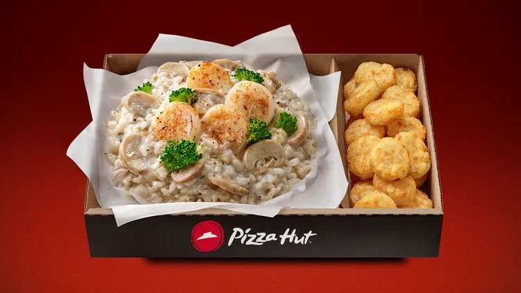 必勝客My Hot Box任一口味紙包飯，6月底前加一元多一件副食。業者提供