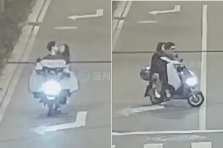 情侶騎車忘情接吻偏離車道。取自微博