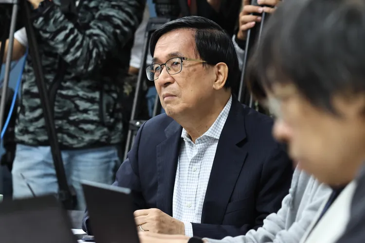 陳水扁一開始在面對媒體時不發一語。施昂強攝