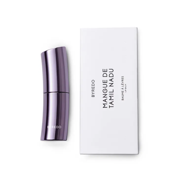 芒果護唇膏被包裹於紫色曲線金屬外殼中。品牌提供