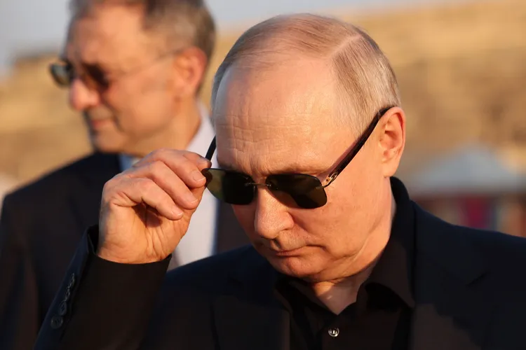 普丁維護強人形象。美聯社