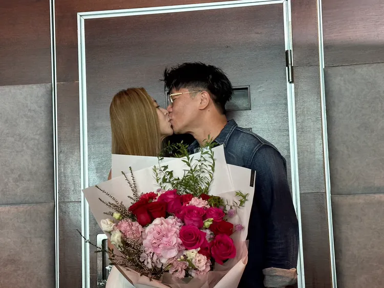 張棋惠跟老公嘴對嘴親吻。林丞偉攝