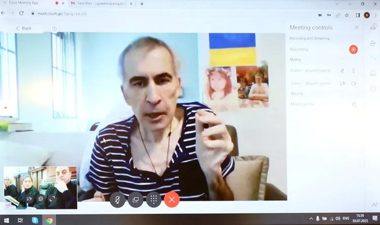 薩卡希維利3日透過視訊出庭。路透社