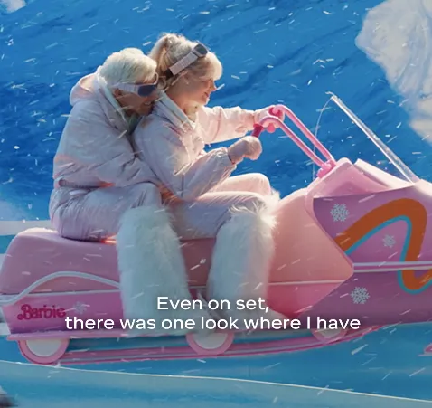 瑪歌羅比與萊恩葛斯林此幕身著的滑雪裝都出自香奈兒。品牌提供