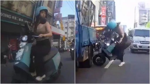 細肩帶妹子撞車重摔 目擊者:10位熱心男幫撐傘指揮交通