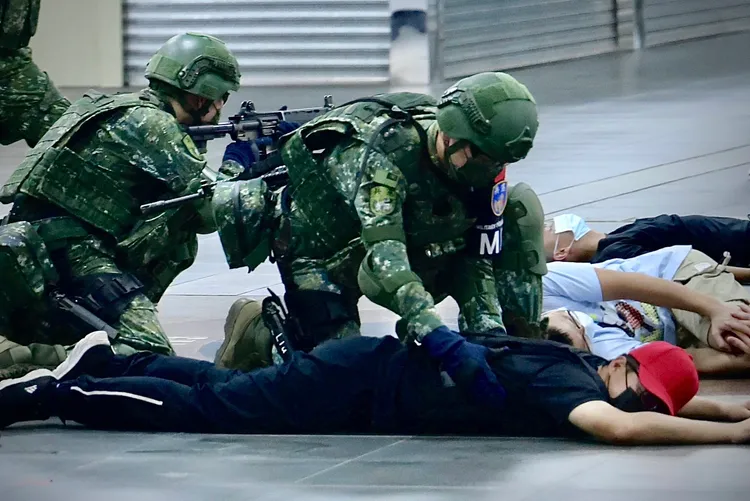 憲兵制伏敵軍。林林攝