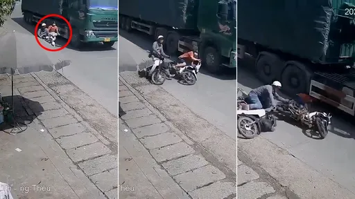 驚悚影片｜騎士超車「鑽車縫摔趴」　瞬間被大貨車輾斃