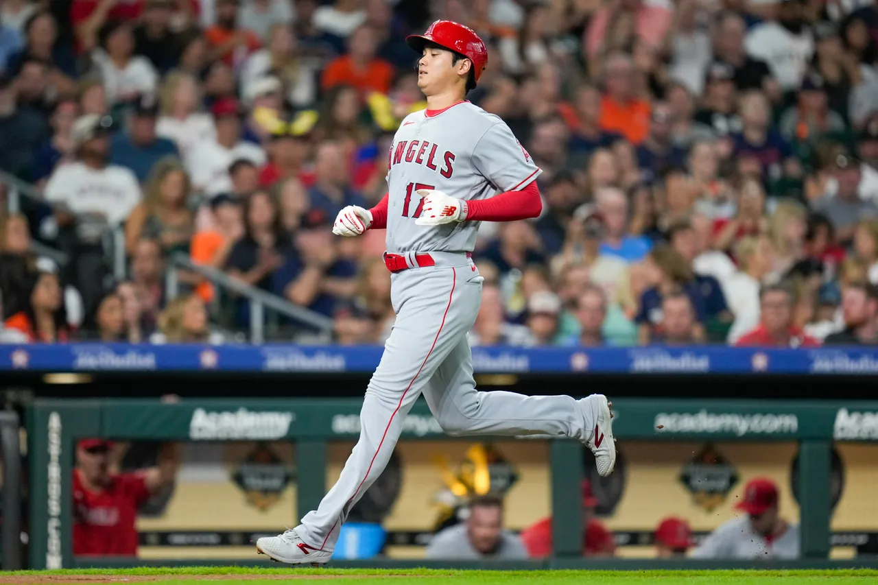 大谷翔平跑回本壘得分。美聯社