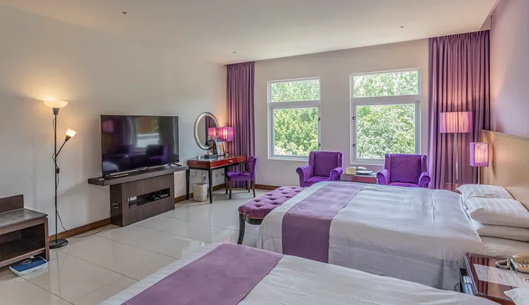 日暉國際渡假村飯店區雙人房型。日暉國際渡假村提供