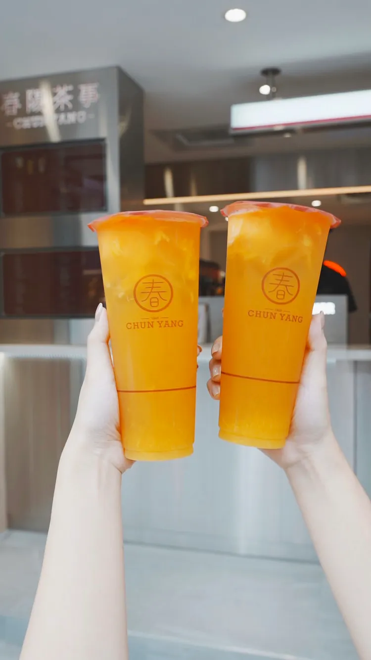 芒果青茶兩杯77折優惠限門市購買。春陽茶事提供