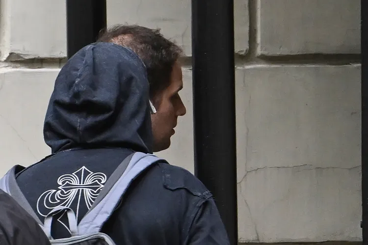 格什科維奇24日步入莫斯科法院。美聯社