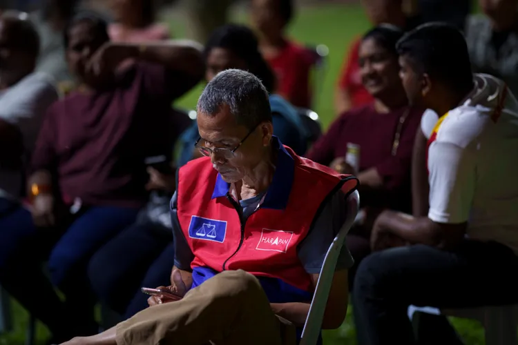 團結政府支持者參與造勢大會。美聯社