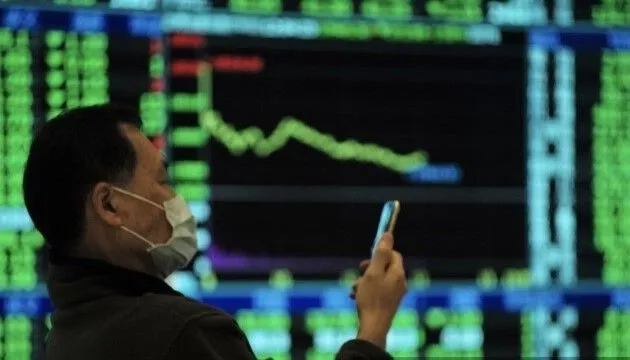 昨台股遭碧桂園引爆的危機牽累，短線籌碼凌亂。法新社