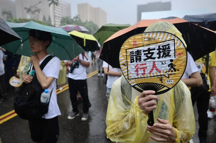 還路於民遊行大雷雨中登場。林林攝
