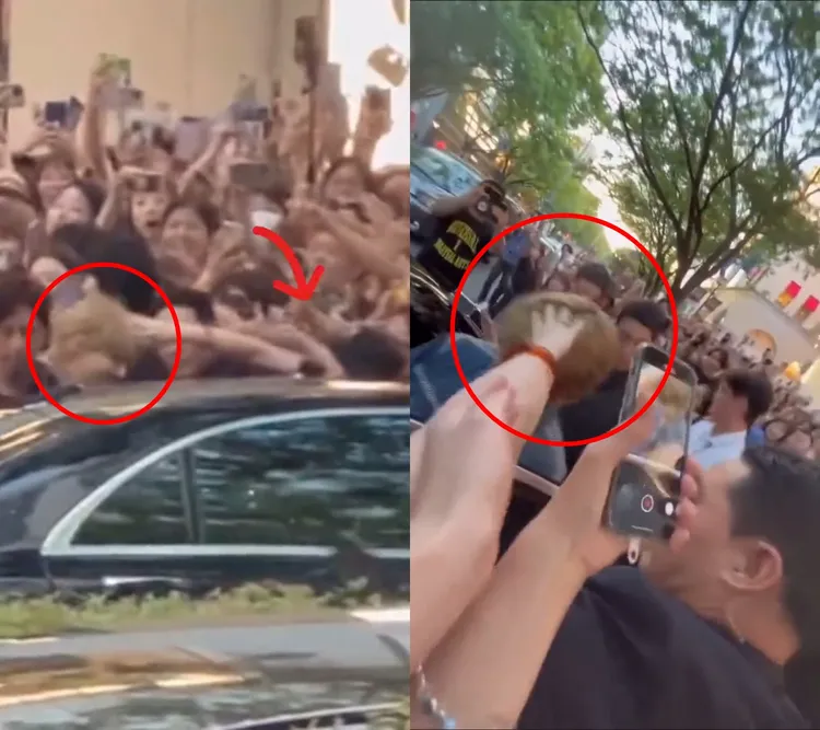 V走出店外準備上車時，被一名女粉絲抓頭髮。翻攝推特