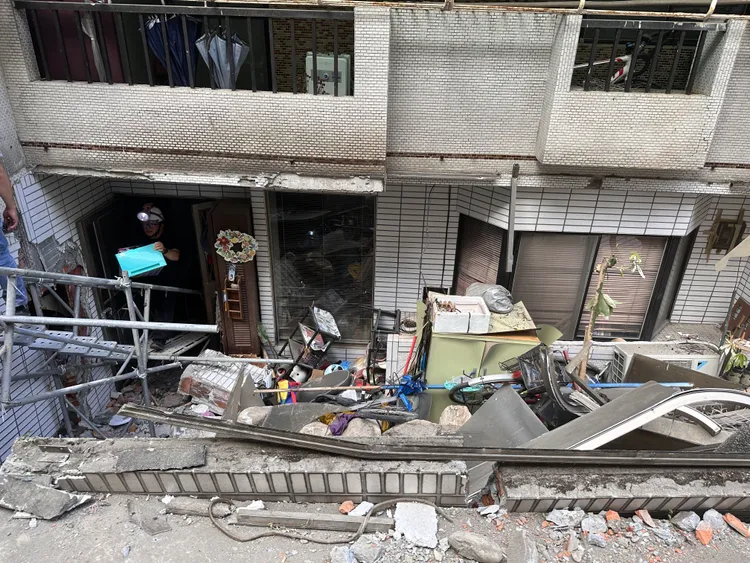 下沉棟一樓住戶取物。都發局提供