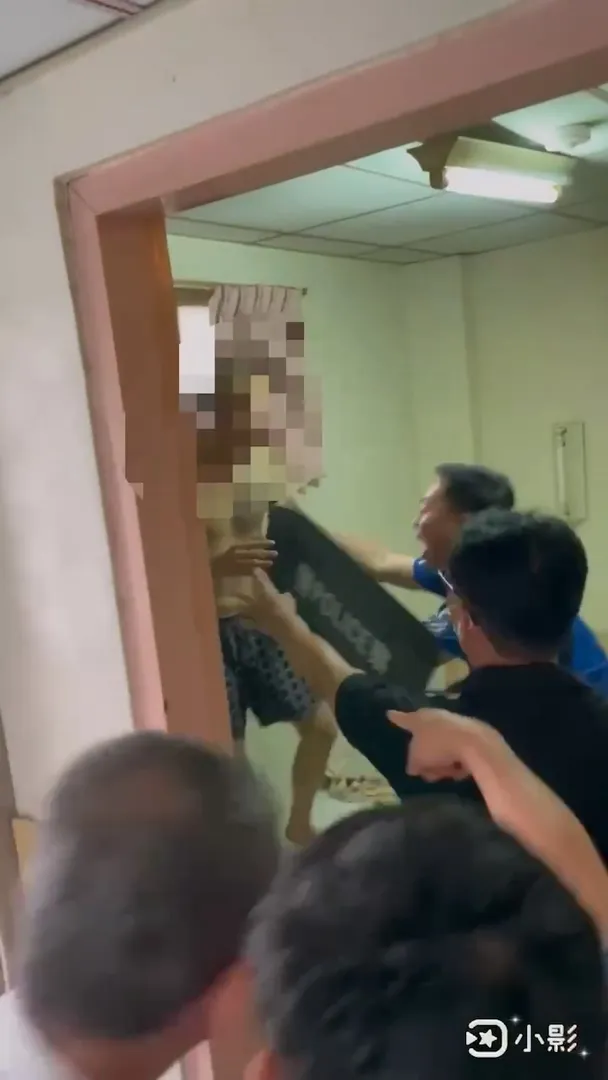 落跑受刑人邱建偉在新營旅館被捕。翻攝畫面